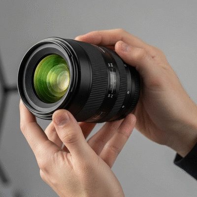 Professional plumber inspecting pipes in a commercial setting